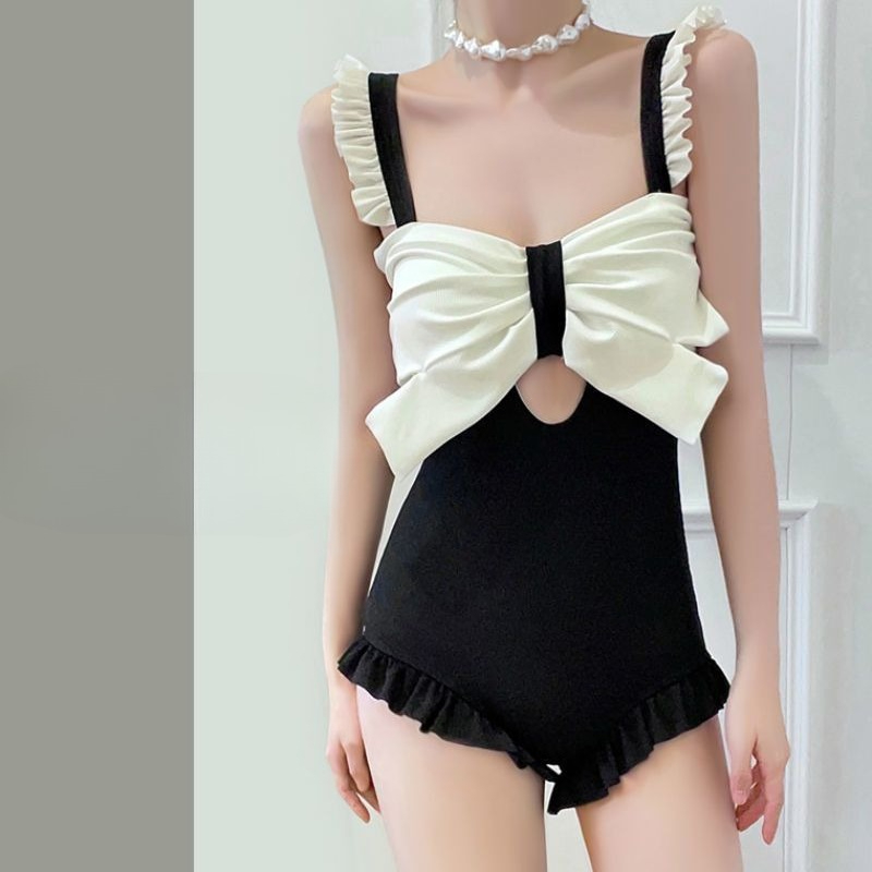Leuke badkleding met strikdeta - Costumes recensie en prijs